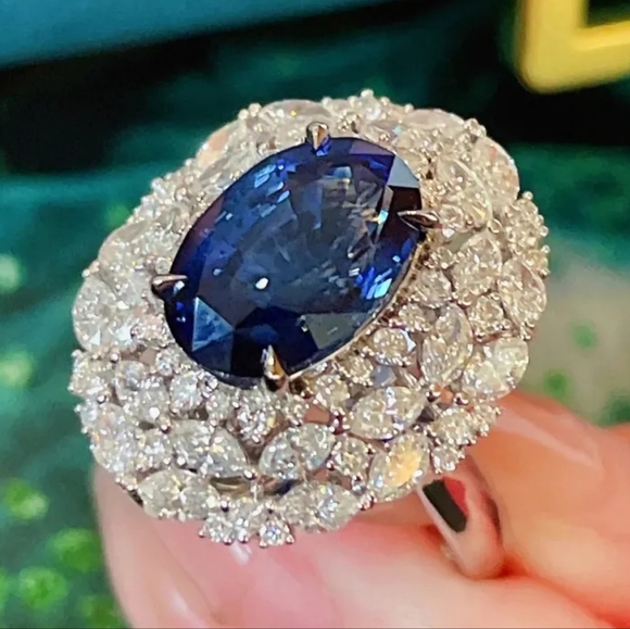 925 Silver Lab Created Blue Sapphire Oval Shaped Adjustable Ring - Picture 2 of 4